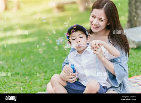 asia mom and son porn|MOMENTS IN TIME: For mother and son, happiness is simply .